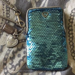Coach poppy wristlet. Light blue sequins.